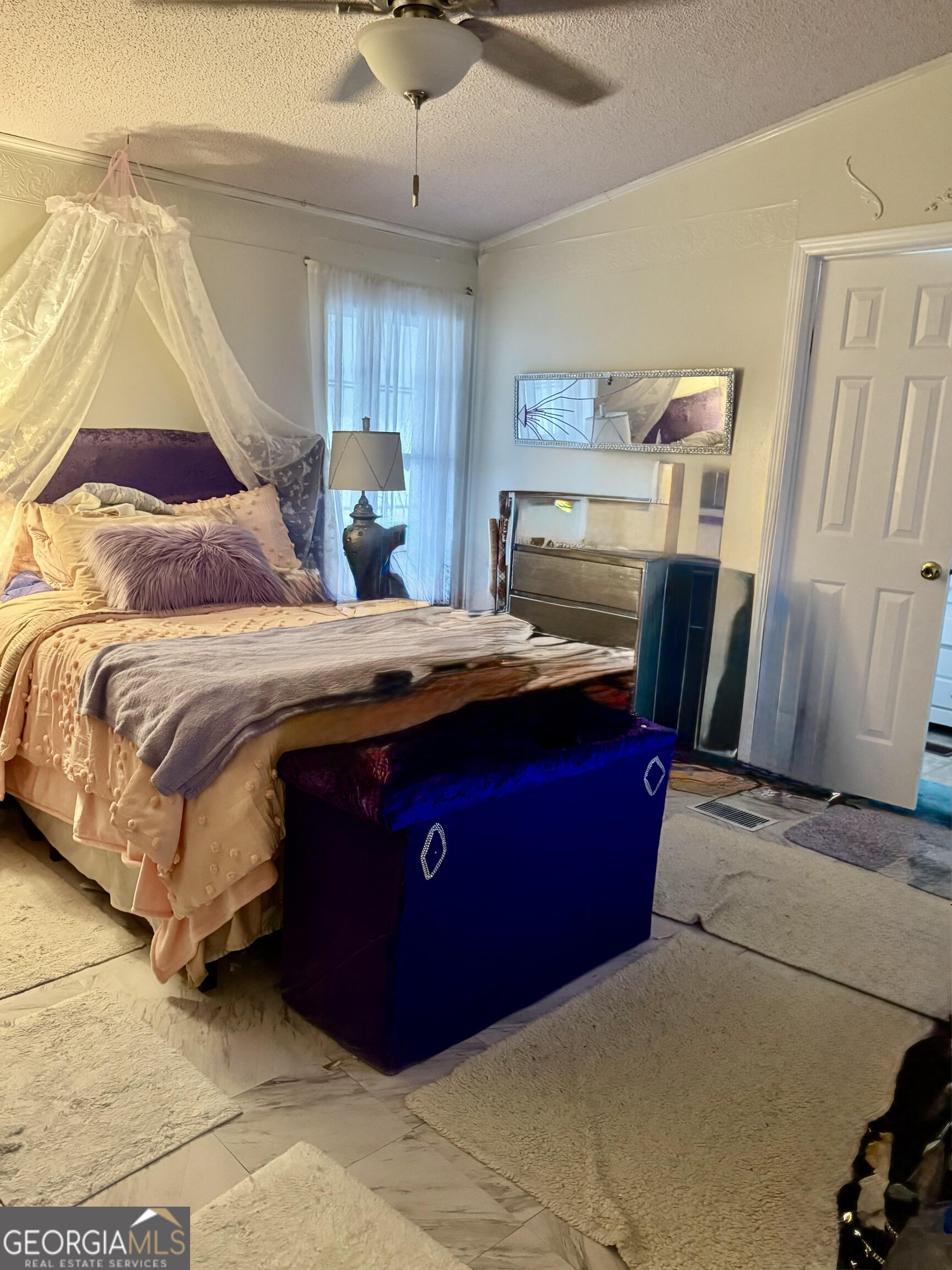 29 Settlement Road Dallas, GA 30132 - Photo 7 of 13 a bedroom with a bed and a mirror