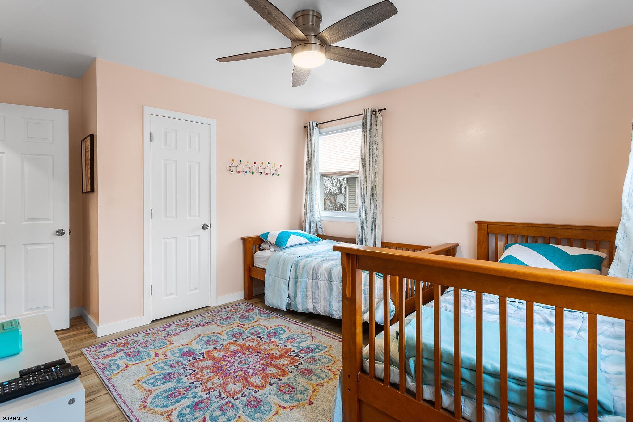 4611 Schooner Road, Unit 2 Brigantine, NJ 08203 - Photo 20 of 25 a living room with furniture and a rug