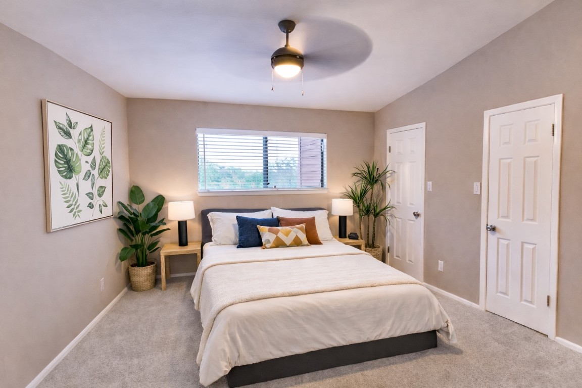 1501 Barton Springs Road, Unit 240 Austin, TX 78704 - Photo 15 of 23 Bedroom with carpet and ceiling fan