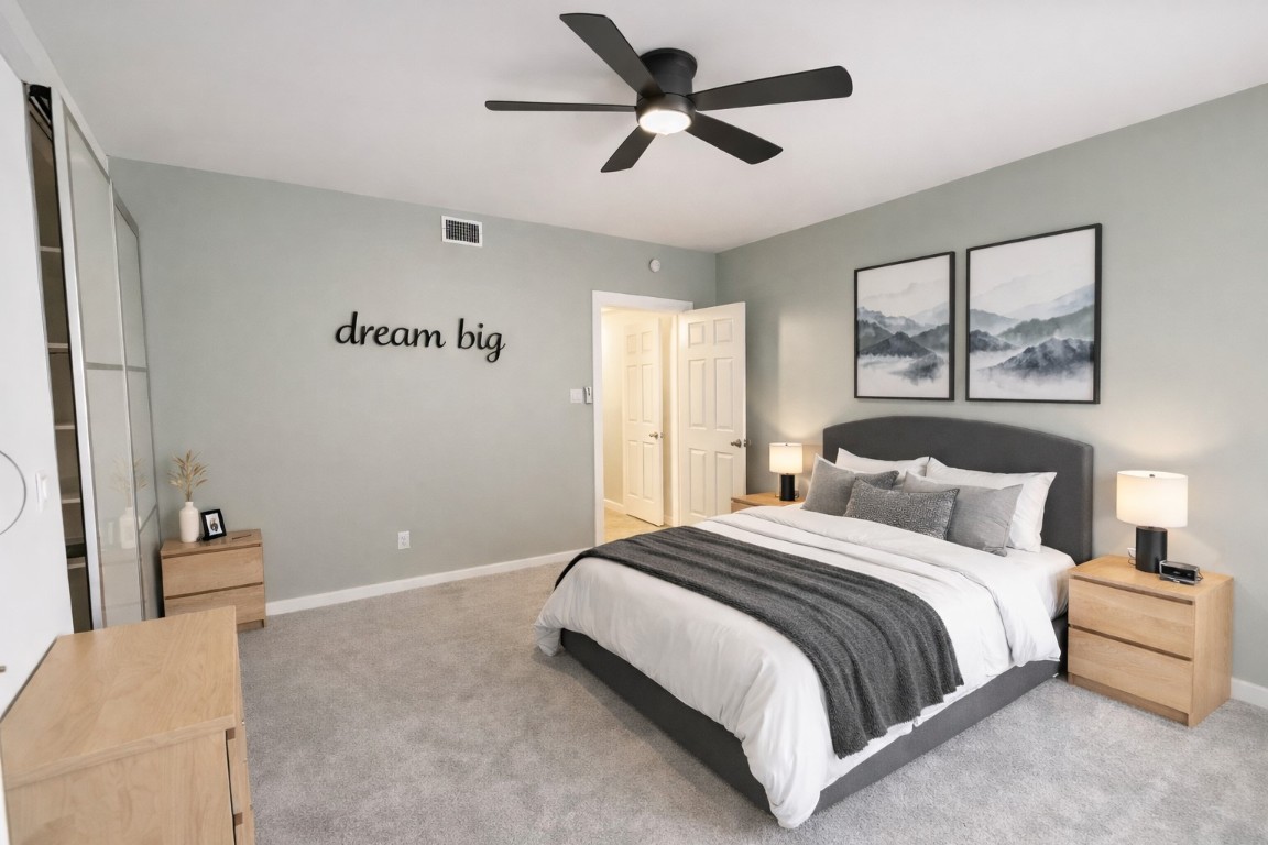 1501 Barton Springs Road, Unit 240 Austin, TX 78704 - Photo 9 of 23 Bedroom featuring light colored carpet and ceiling fan
