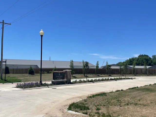 a view of a swimming pool with a house