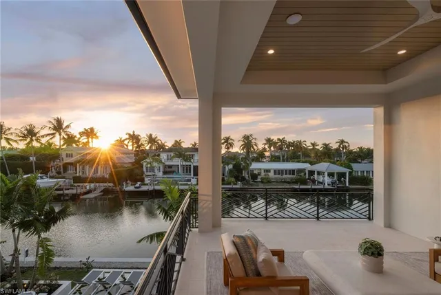 a view of a balcony with lake view and mountain view