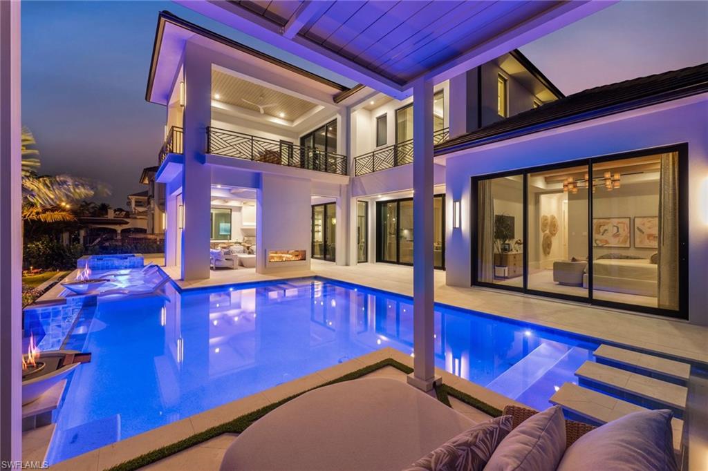 1990 7th Street South Naples, FL 34102 - Photo 47 of 49 a view of an chairs and table in the balcony