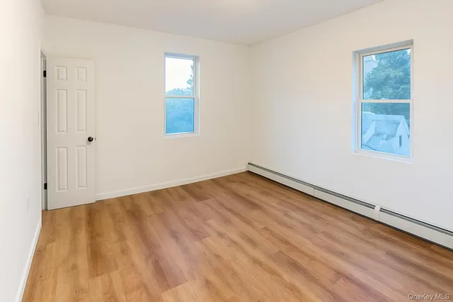 an empty room with windows