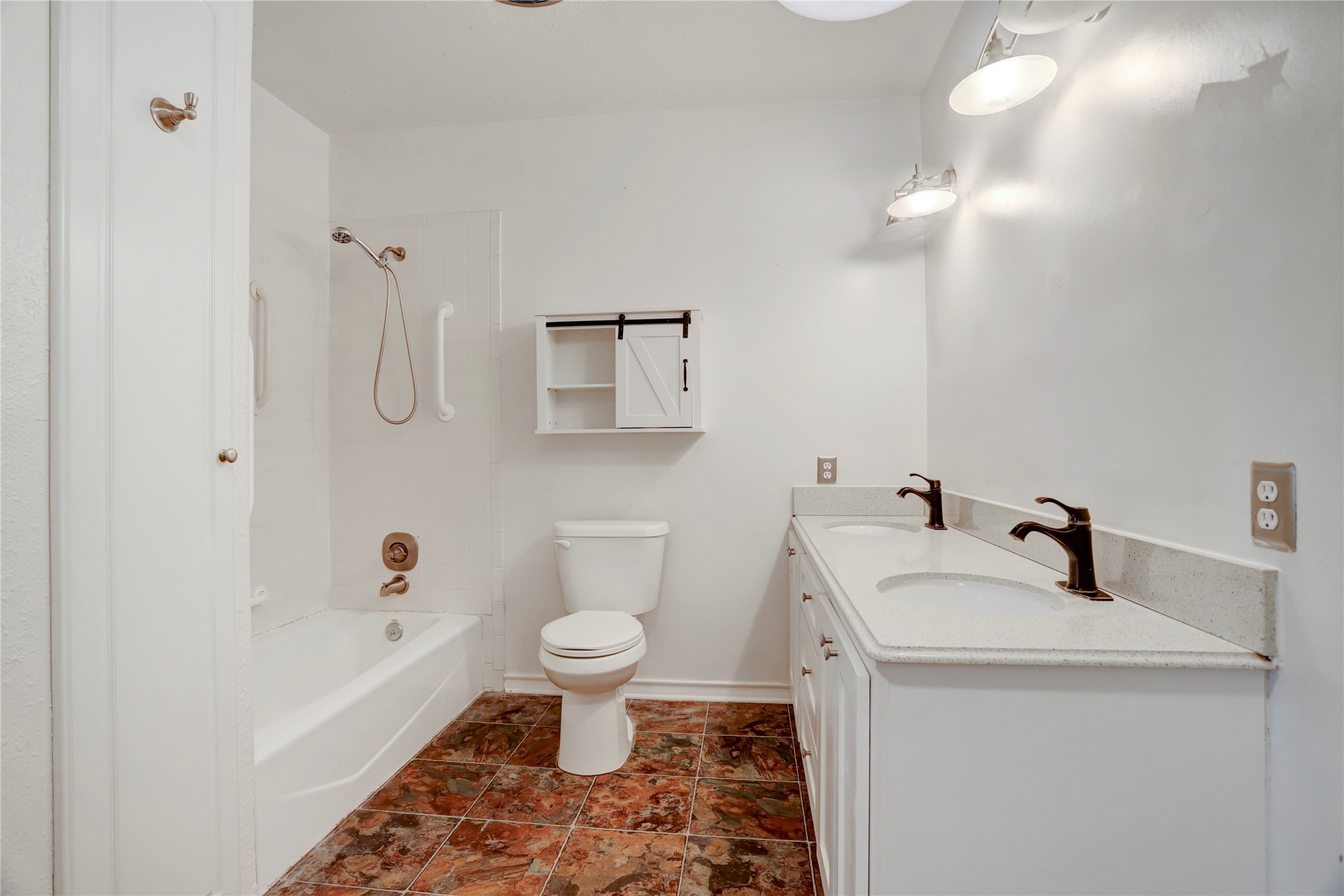 238 Bridge Street Glen Flora, TX 77443 - Photo 16 of 34 a bathroom with a sink toilet a mirror and shower