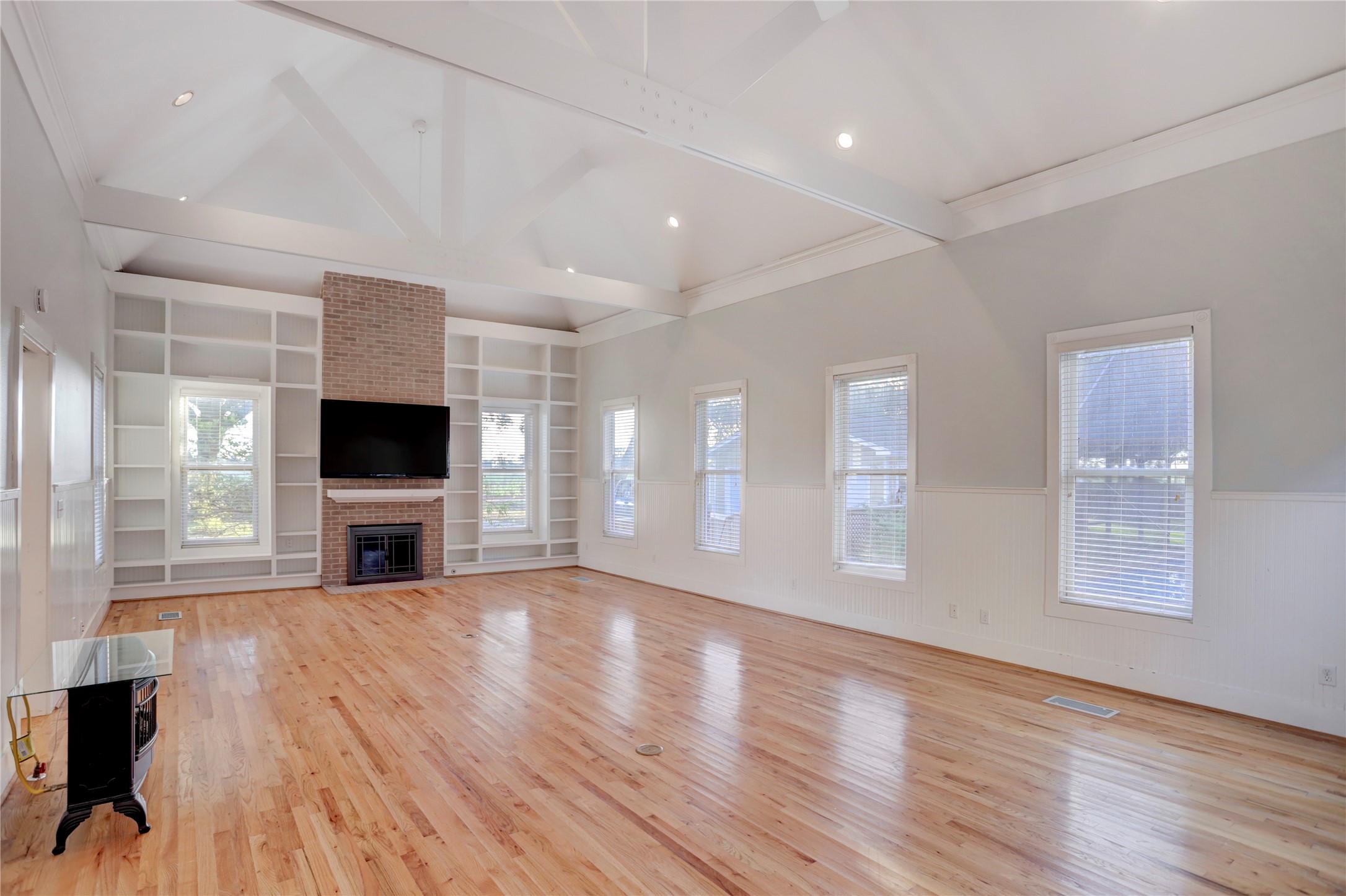 238 Bridge Street Glen Flora, TX 77443 - Photo 17 of 34 a view of a livingroom with wooden floor and a fireplace