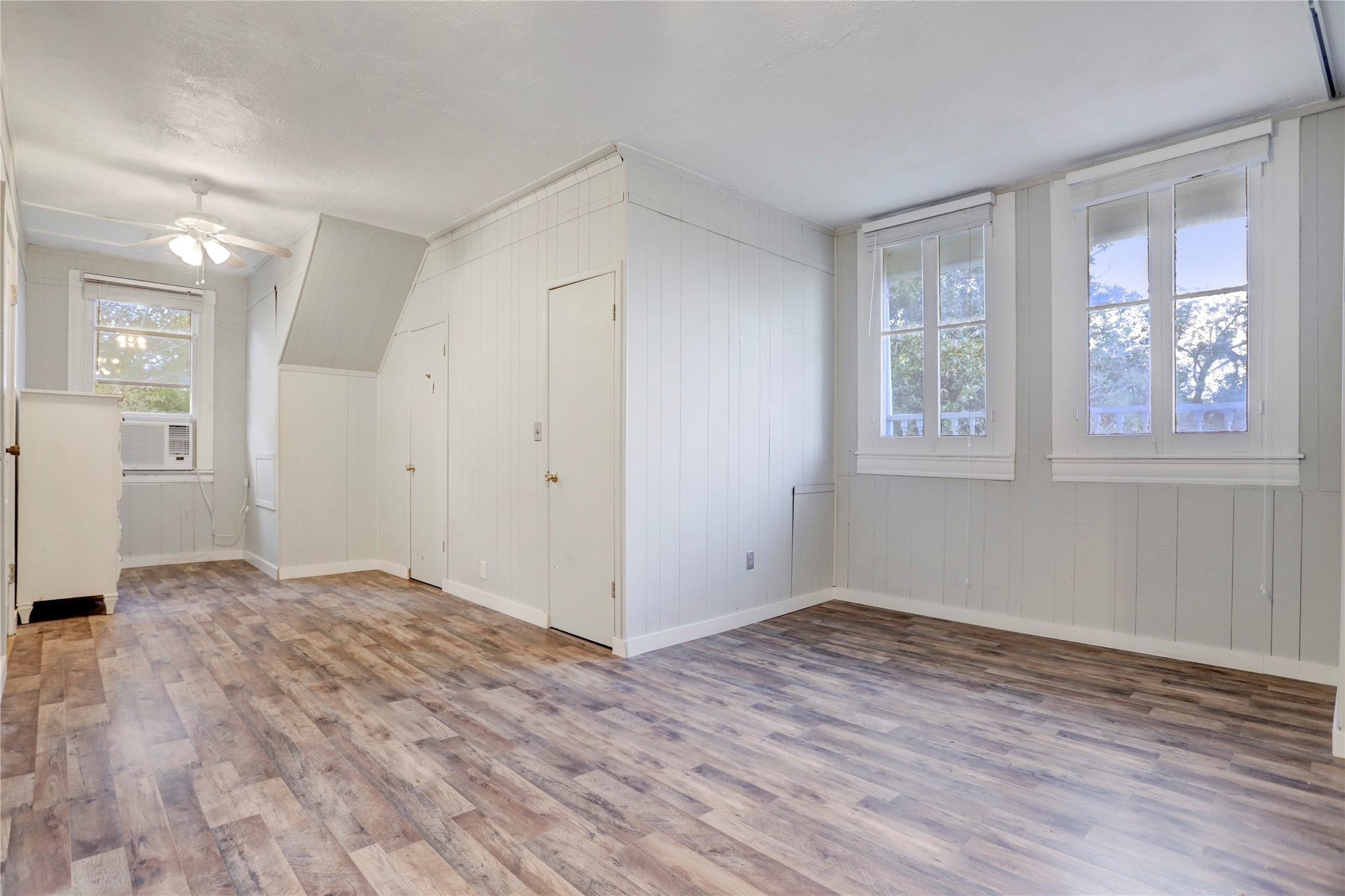 238 Bridge Street Glen Flora, TX 77443 - Photo 20 of 34 a view of empty room with wooden floor and fan