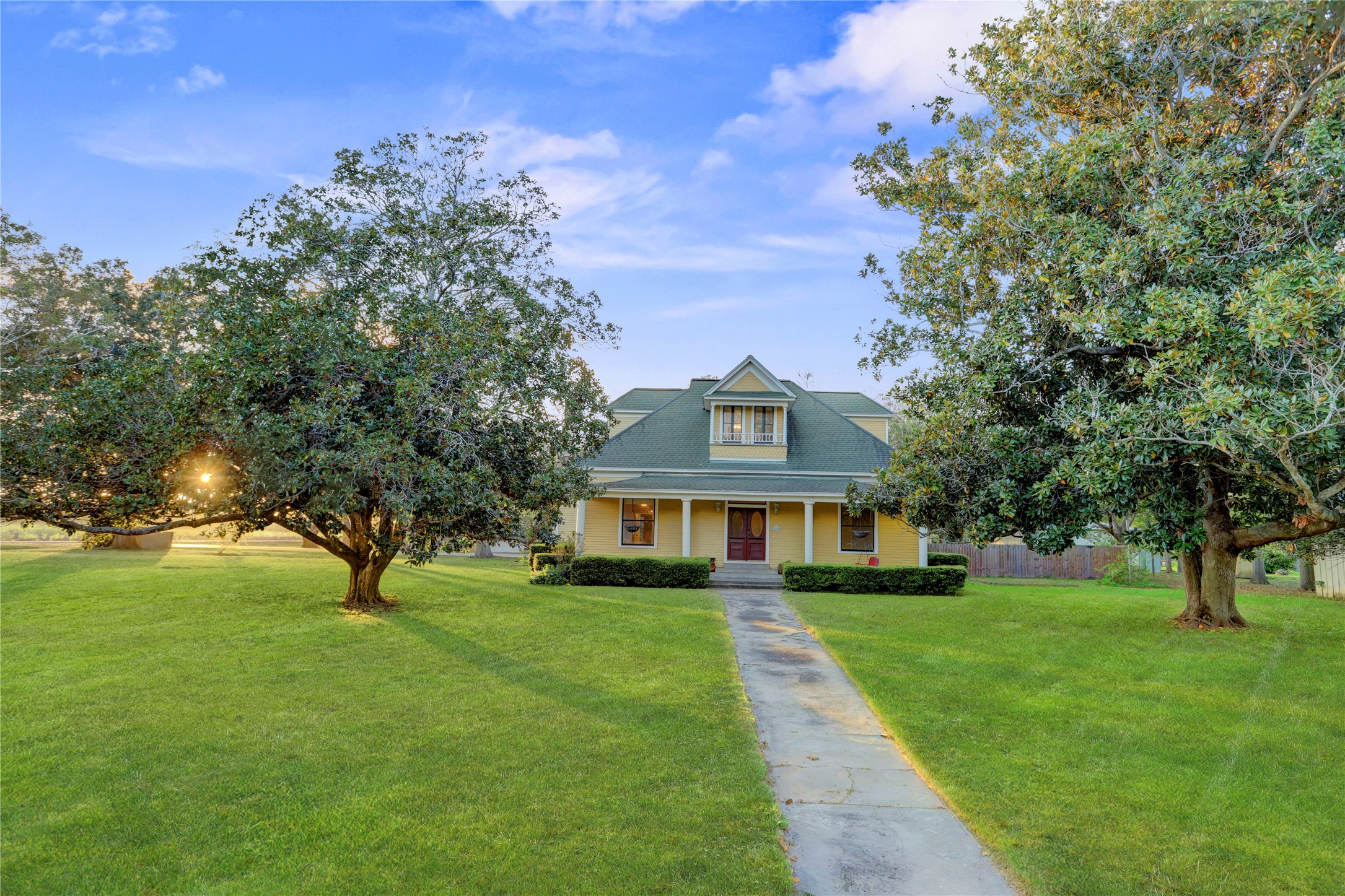 238 Bridge Street Glen Flora, TX 77443 - Photo 2 of 34 a front view of a house with a yard