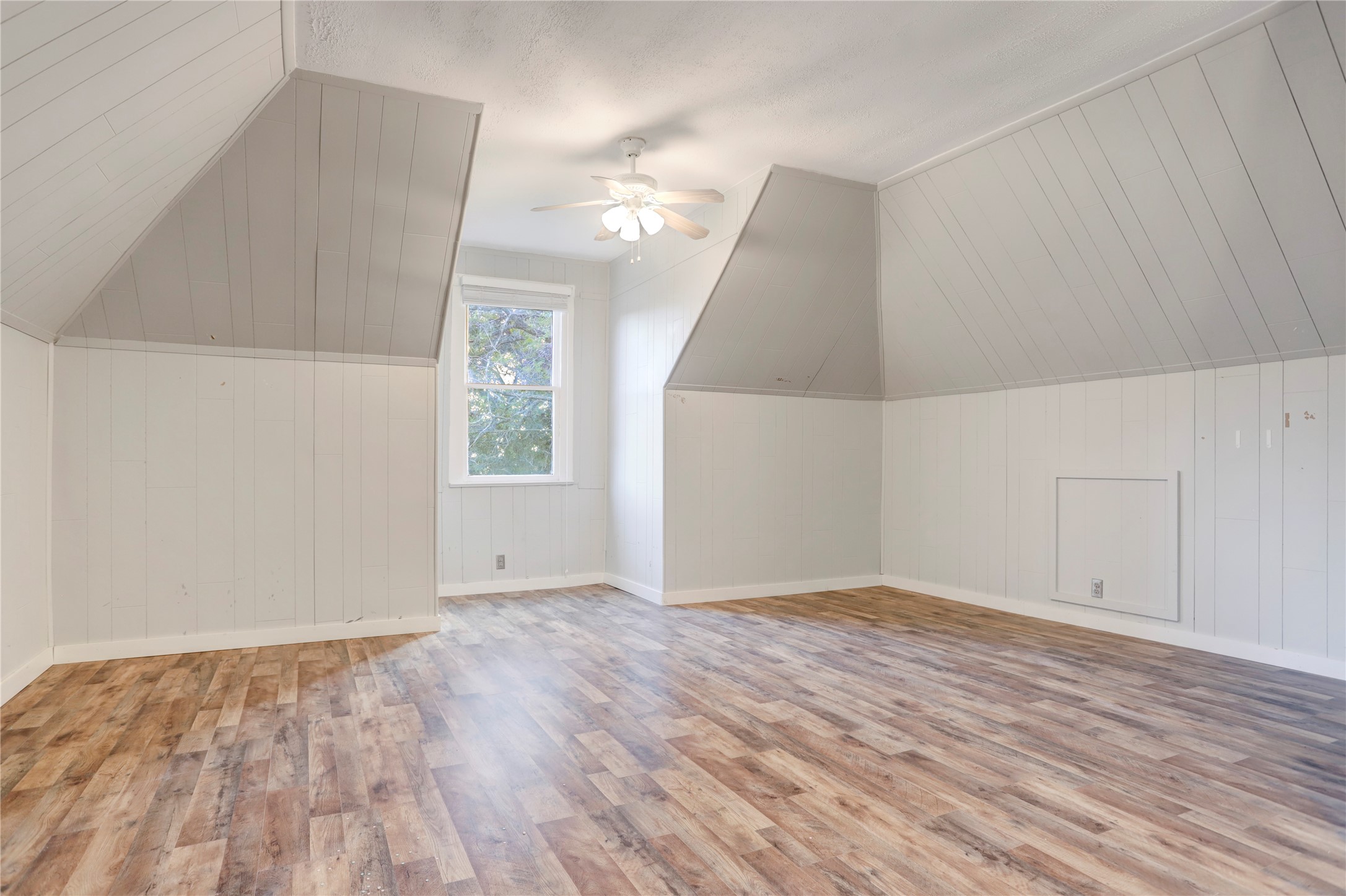 238 Bridge Street Glen Flora, TX 77443 - Photo 21 of 34 an empty room with wooden floor and windows