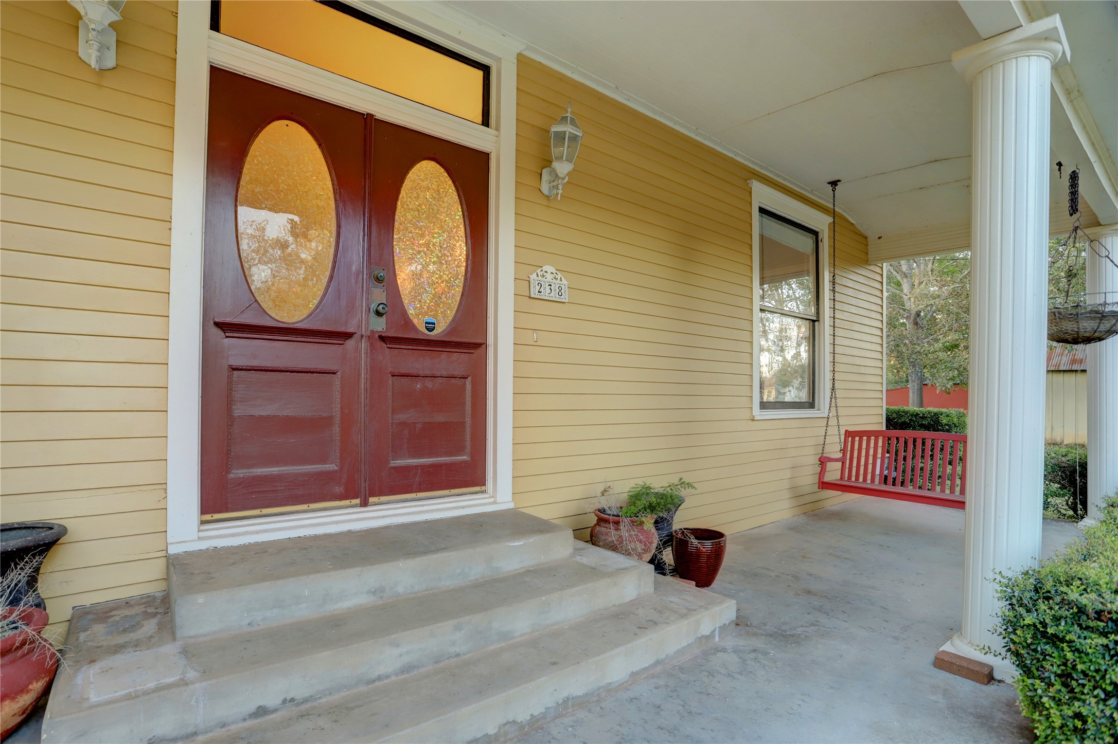 238 Bridge Street Glen Flora, TX 77443 - Photo 4 of 34 a front view of a house with garden