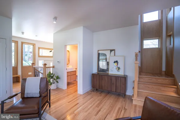 a room with furniture and wooden floor