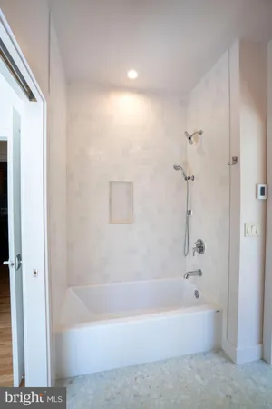 a bathroom with a bathtub