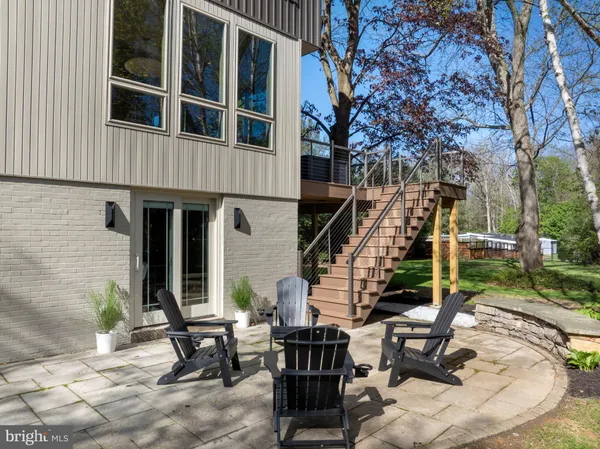 a view of a building with sitting area