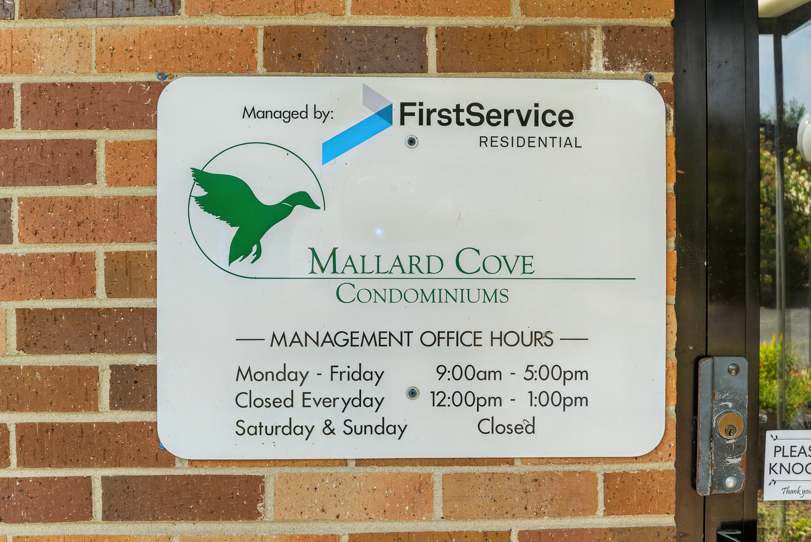 1207 South Old Wilke Road, Unit 303 Rolling Meadows, IL 60005 - Photo 18 of 34 a sign on the wall of a building