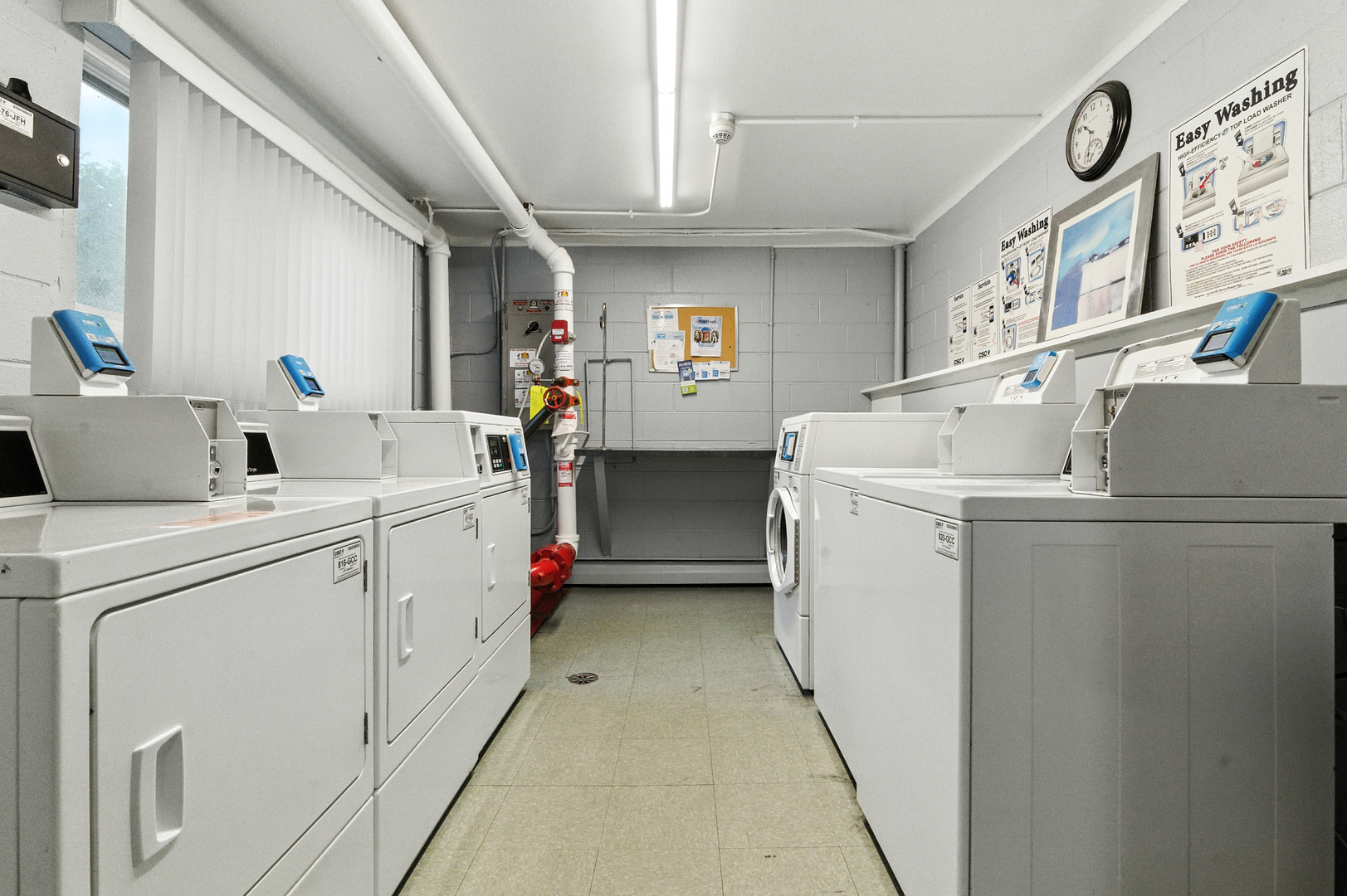 1207 South Old Wilke Road, Unit 303 Rolling Meadows, IL 60005 - Photo 27 of 34 a utility room with dryer and washer