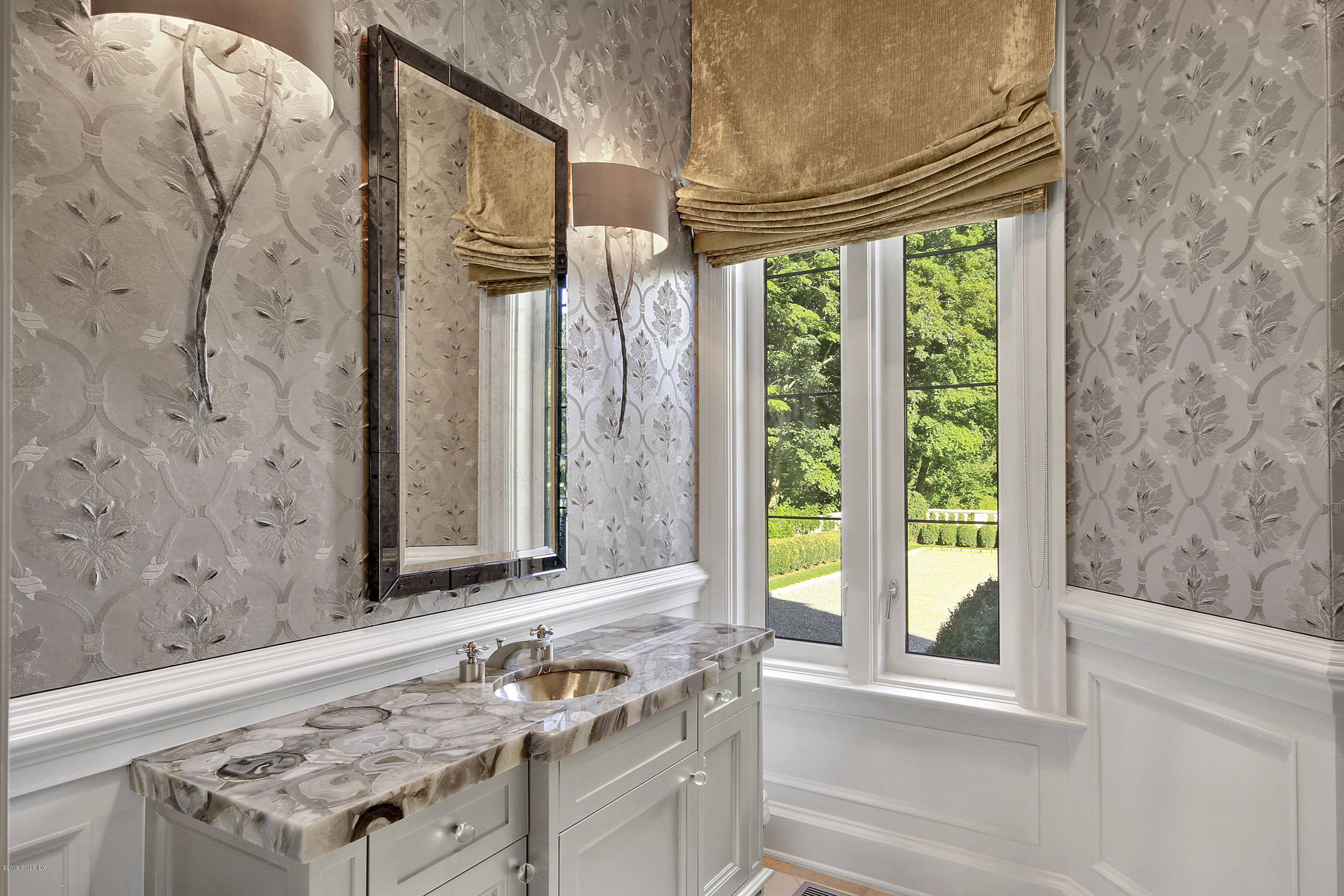 19 Lower Cross Road Greenwich, CT 06831 - Photo 16 of 36 a view of a kitchen with a stove and a window