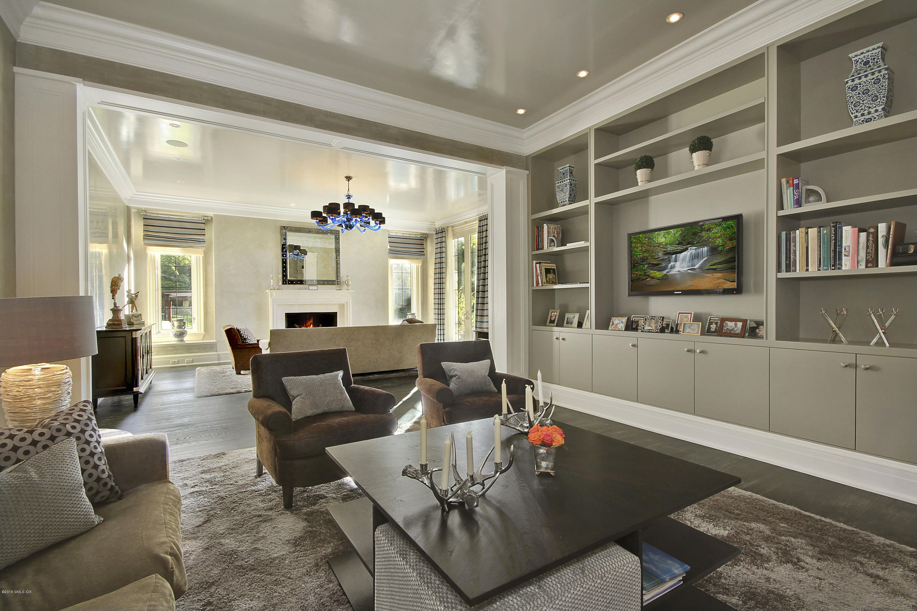 19 Lower Cross Road Greenwich, CT 06831 - Photo 18 of 36 a living room with furniture and a flat screen tv