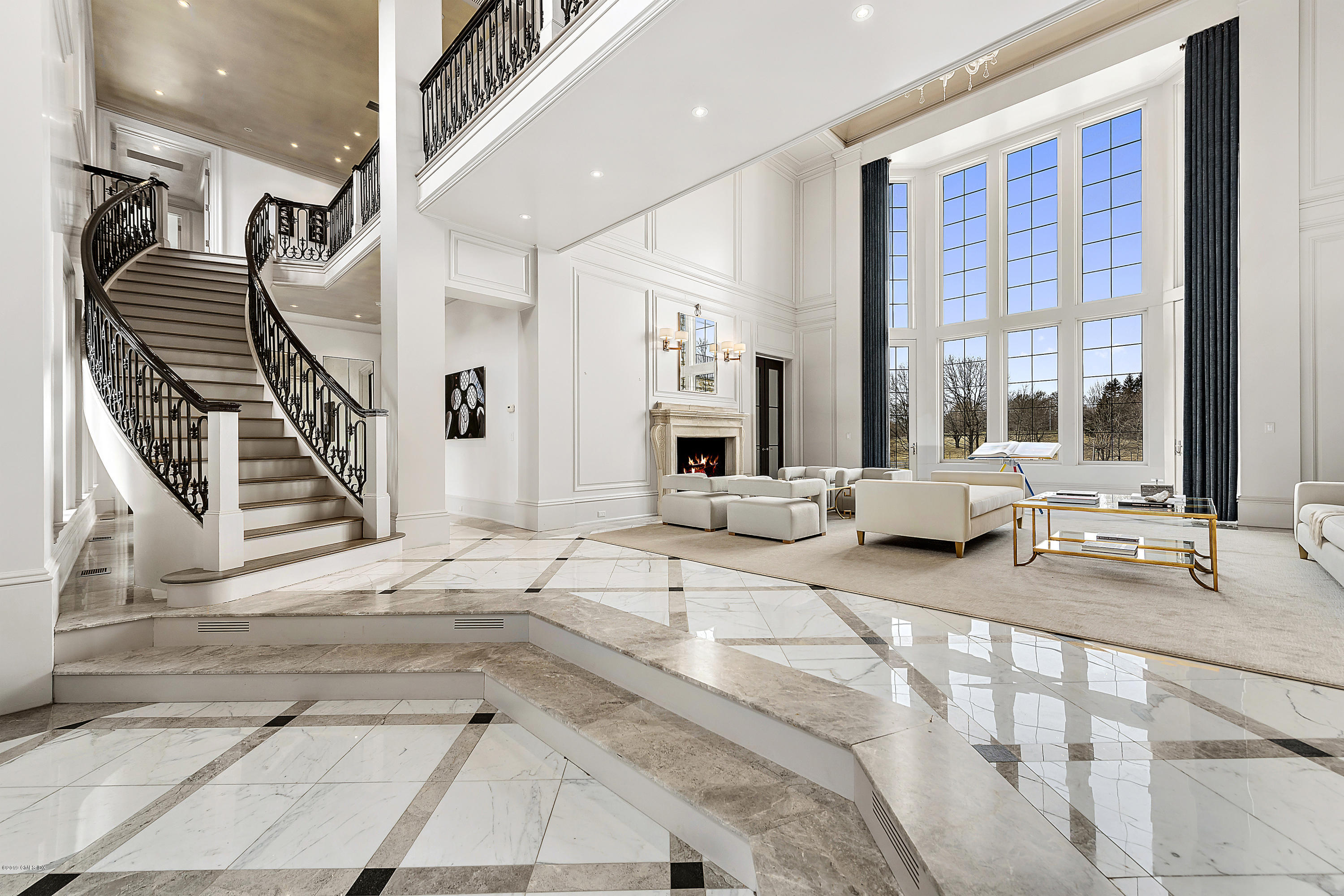 19 Lower Cross Road Greenwich, CT 06831 - Photo 2 of 36 a view of a livingroom with furniture and staircase