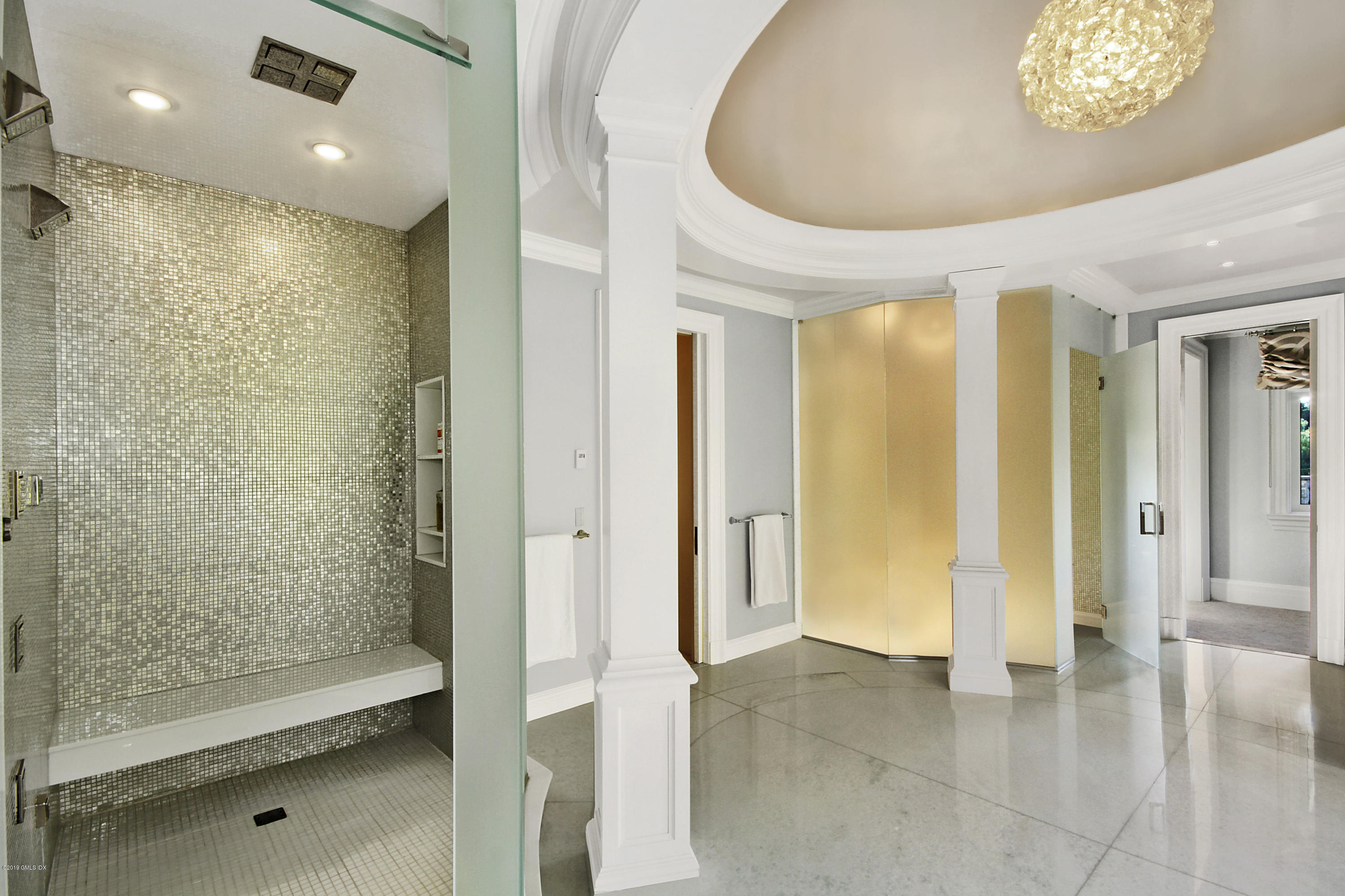 19 Lower Cross Road Greenwich, CT 06831 - Photo 21 of 36 a view of a bathroom with a bathtub and shower