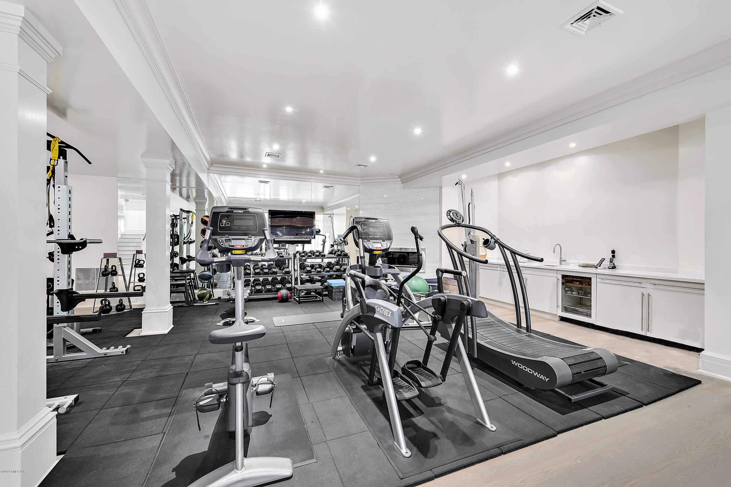 19 Lower Cross Road Greenwich, CT 06831 - Photo 27 of 36 a view of a room with gym equipment