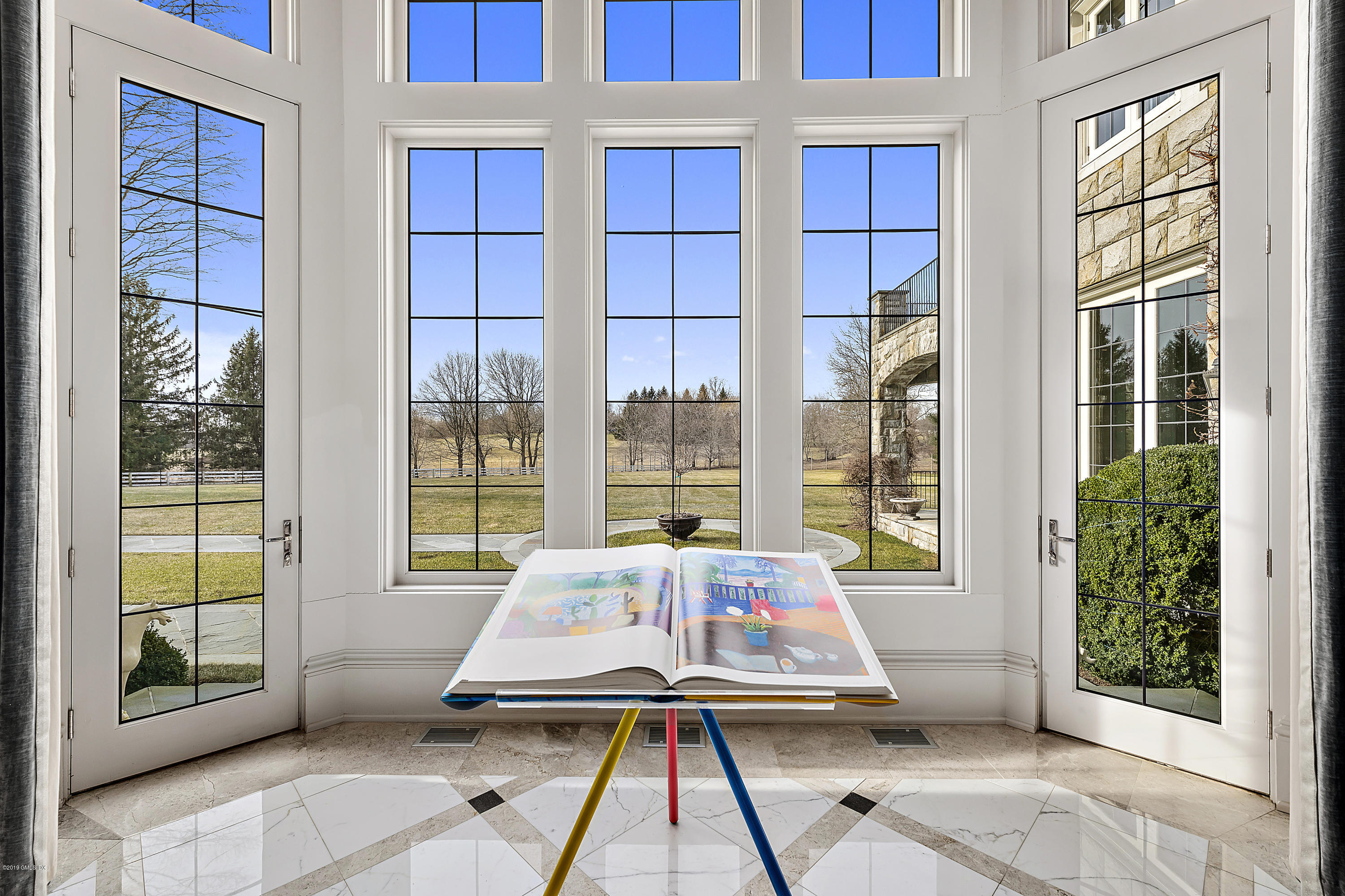 19 Lower Cross Road Greenwich, CT 06831 - Photo 28 of 36 a living room with a large window