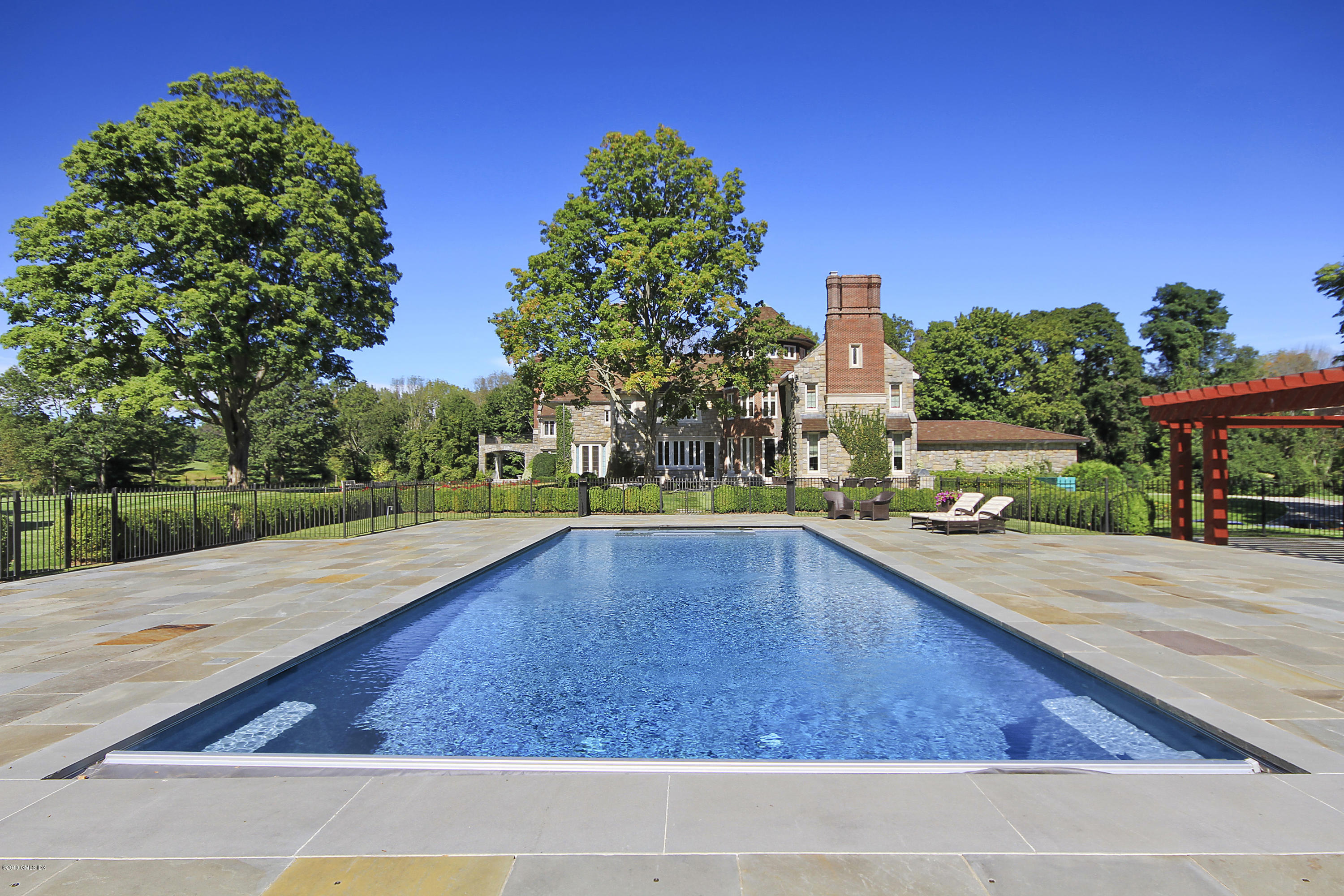19 Lower Cross Road Greenwich, CT 06831 - Photo 32 of 36 a view of swimming pool with outdoor seating and yard
