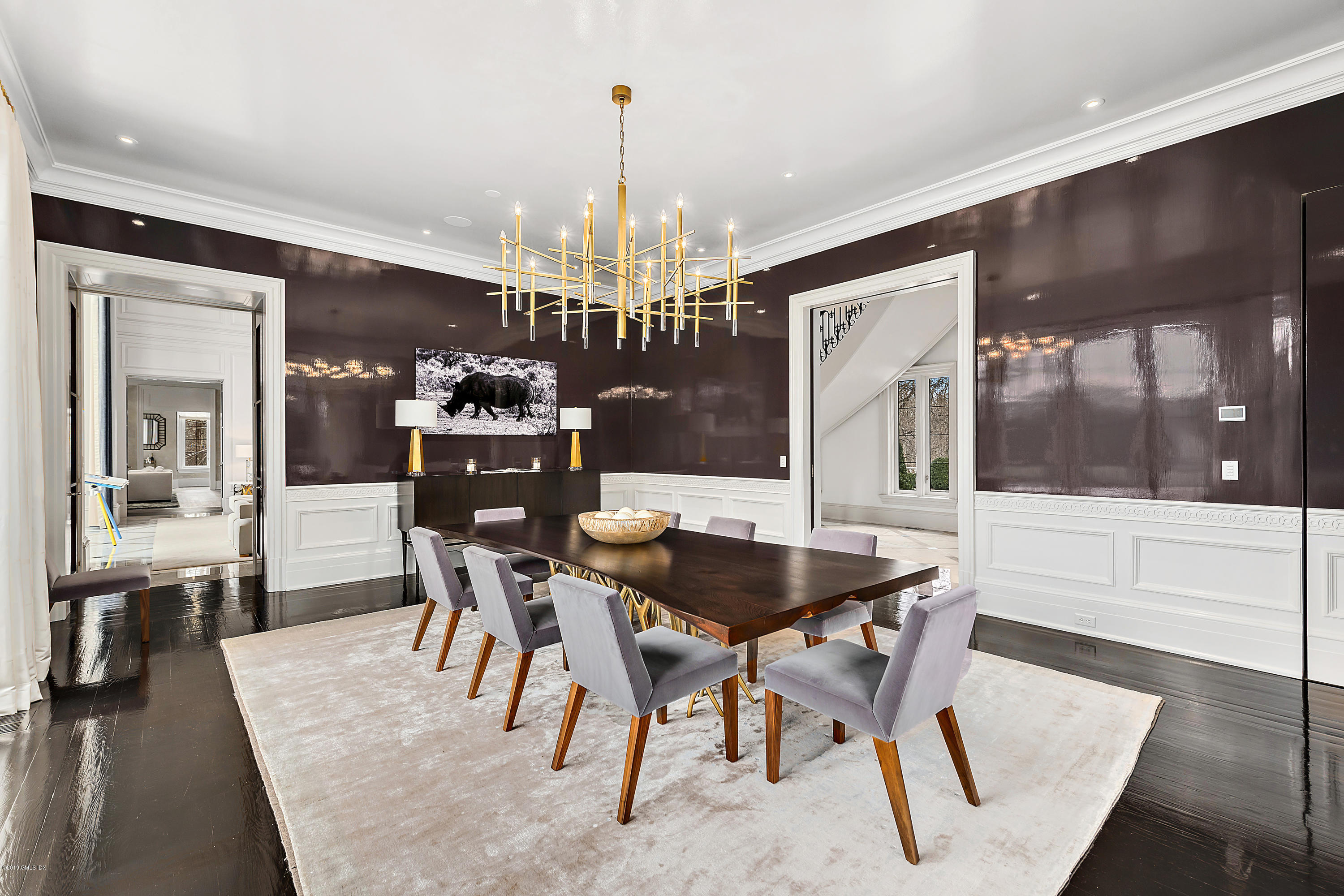 19 Lower Cross Road Greenwich, CT 06831 - Photo 8 of 36 a view of a dining room with furniture and chandelier