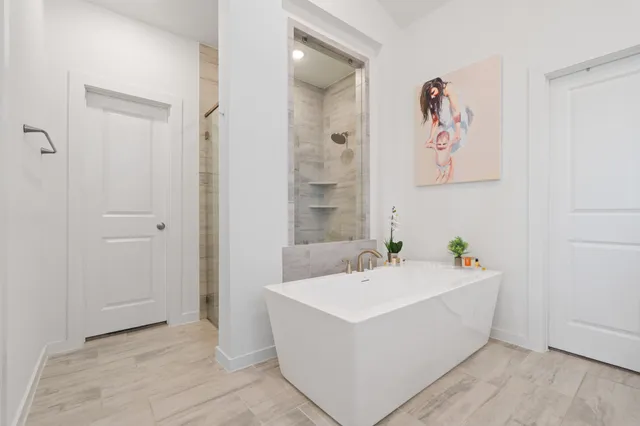 a bathroom with a sink vanity and mirror