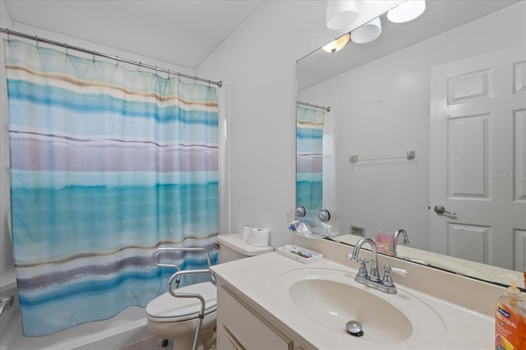 13691 201st Road Live Oak, FL 32060 - Photo 14 of 36 a bathroom with a sink toilet and shower