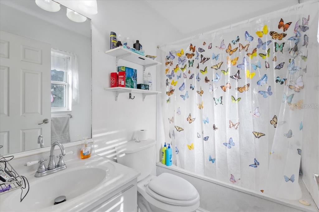 13691 201st Road Live Oak, FL 32060 - Photo 16 of 36 a bathroom with a sink toilet and shower