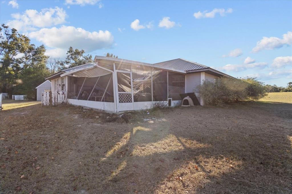 13691 201st Road Live Oak, FL 32060 - Photo 19 of 36 a house view with a outdoor space