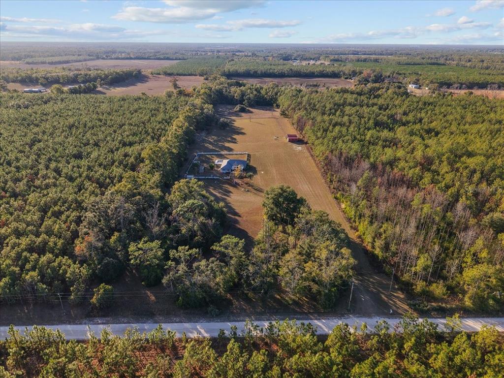 13691 201st Road Live Oak, FL 32060 - Photo 35 of 36 a view of a lake with outdoor space
