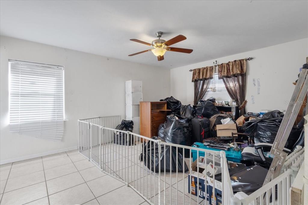 13691 201st Road Live Oak, FL 32060 - Photo 10 of 36 a view of a livingroom with furniture and windows