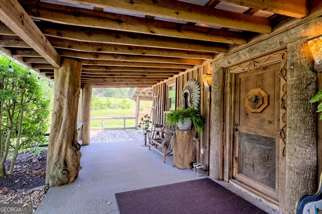 a bathroom with a tub a sink and a mirror