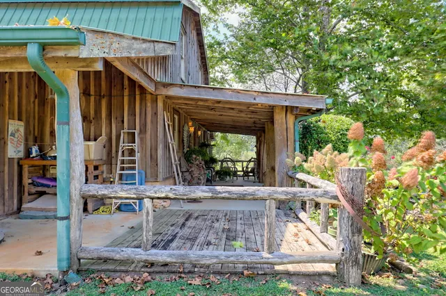 a bed room with a bed and a chair