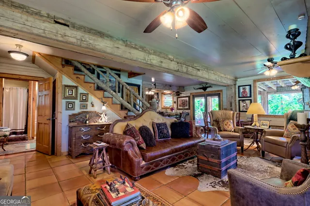 a view of a patio with swimming pool table and chairs