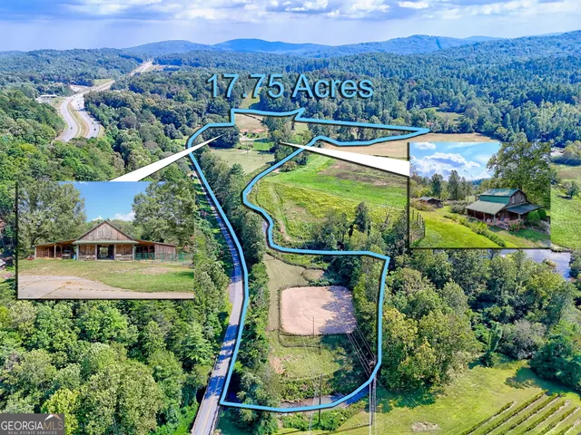 a view of a house with a big yard plants and large trees