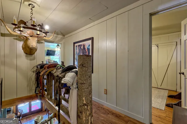 a view of swimming pool with a backyard and plants