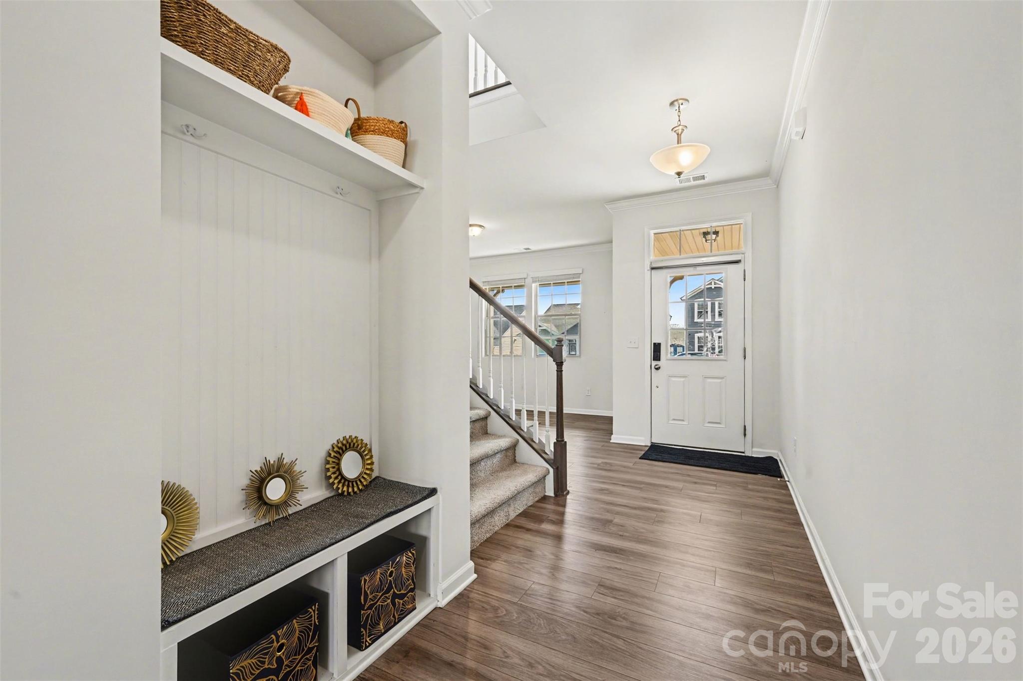 1311 Tollcross Road Indian Trail, NC 28079 - Photo 13 of 34 a view of entryway and hall with wooden floor