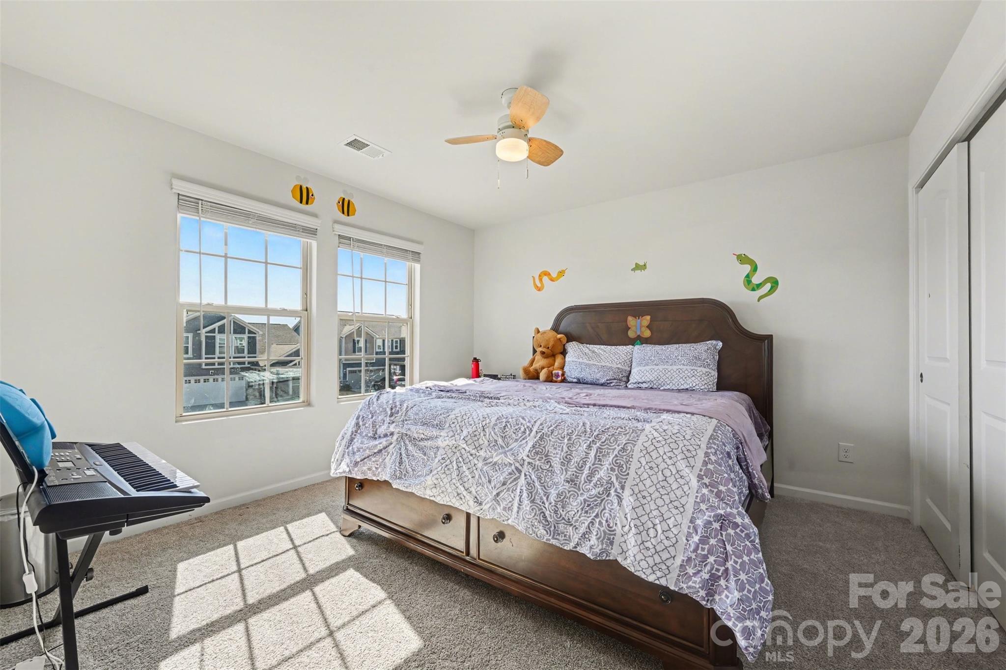 1311 Tollcross Road Indian Trail, NC 28079 - Photo 19 of 34 a bedroom with a bed and window
