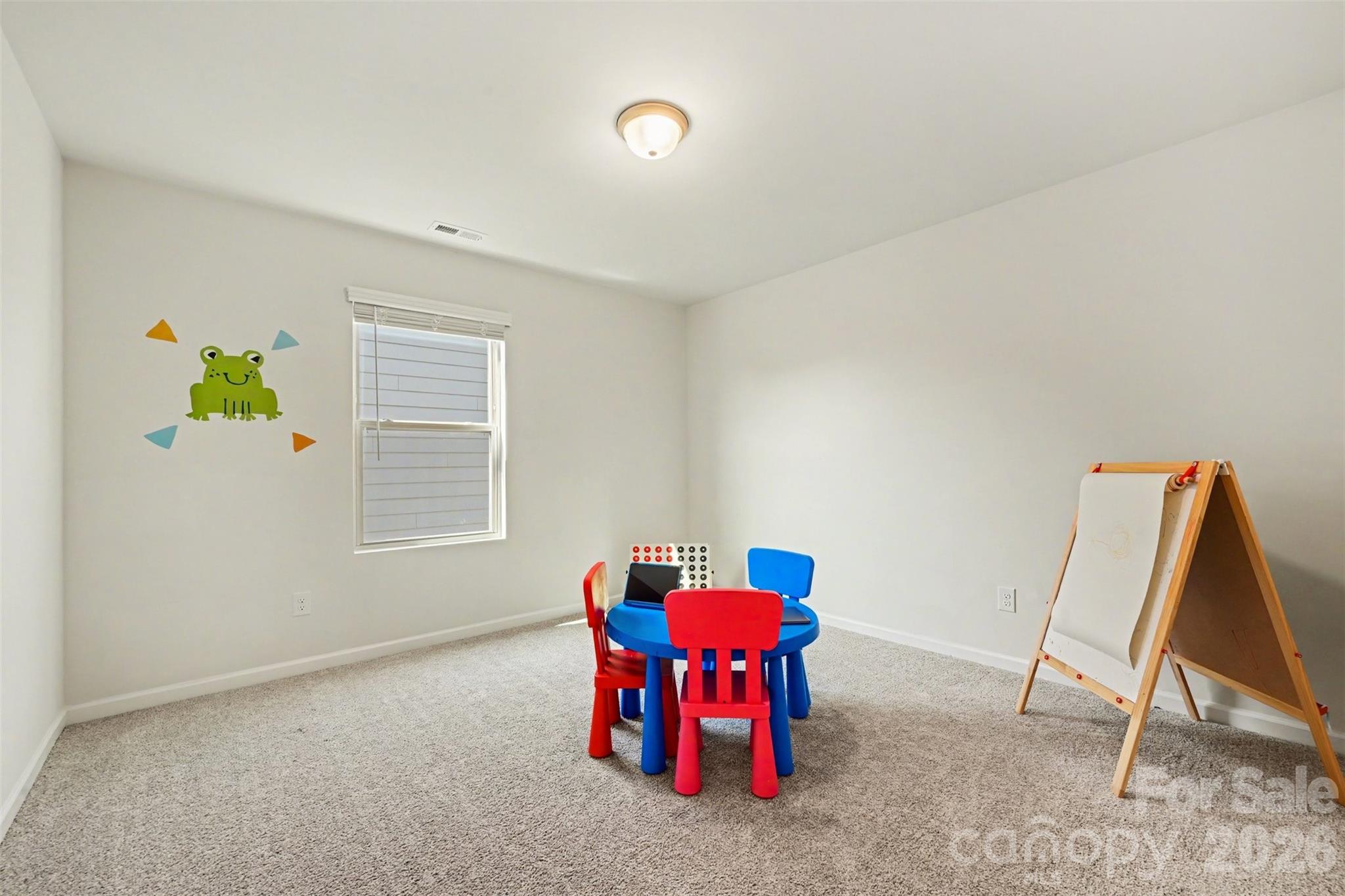 1311 Tollcross Road Indian Trail, NC 28079 - Photo 20 of 34 a living room with furniture and a window