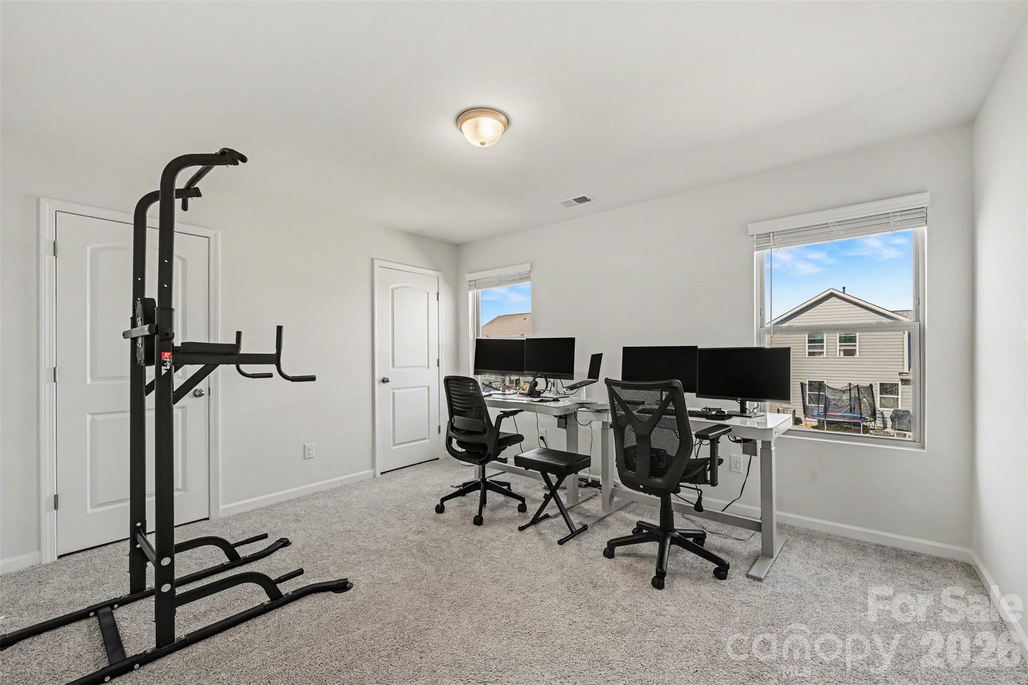 1311 Tollcross Road Indian Trail, NC 28079 - Photo 22 of 34 a view of a workspace with furniture and a window