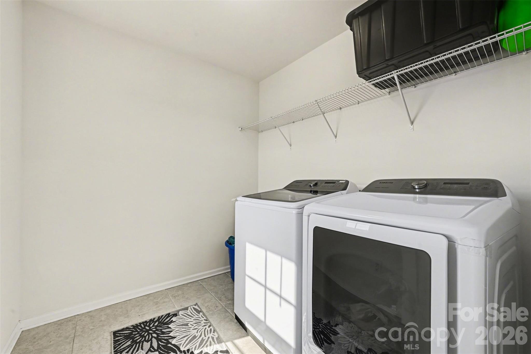 1311 Tollcross Road Indian Trail, NC 28079 - Photo 23 of 34 a utility room with dryer and washer