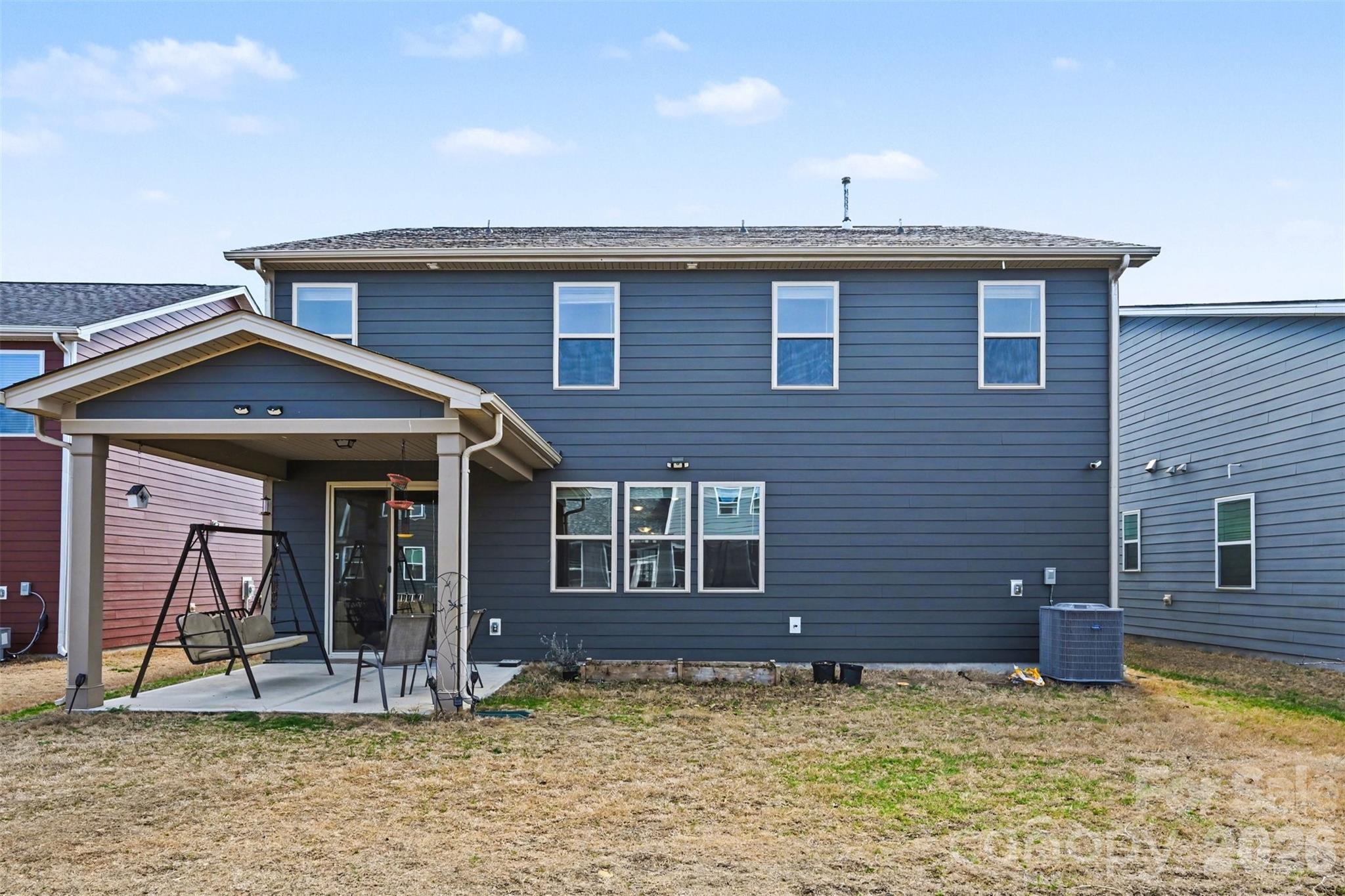 1311 Tollcross Road Indian Trail, NC 28079 - Photo 26 of 34 a front view of a house with a yard