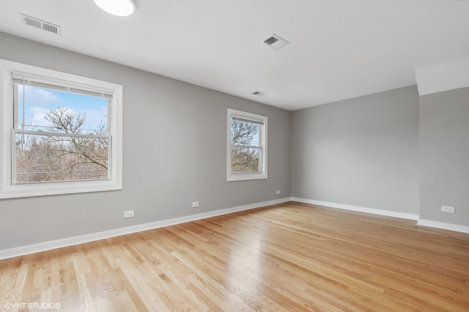 2490 Green Bay Road Highland Park, IL 60035 - Photo 24 of 29 a view of an empty room with wooden floor and a window