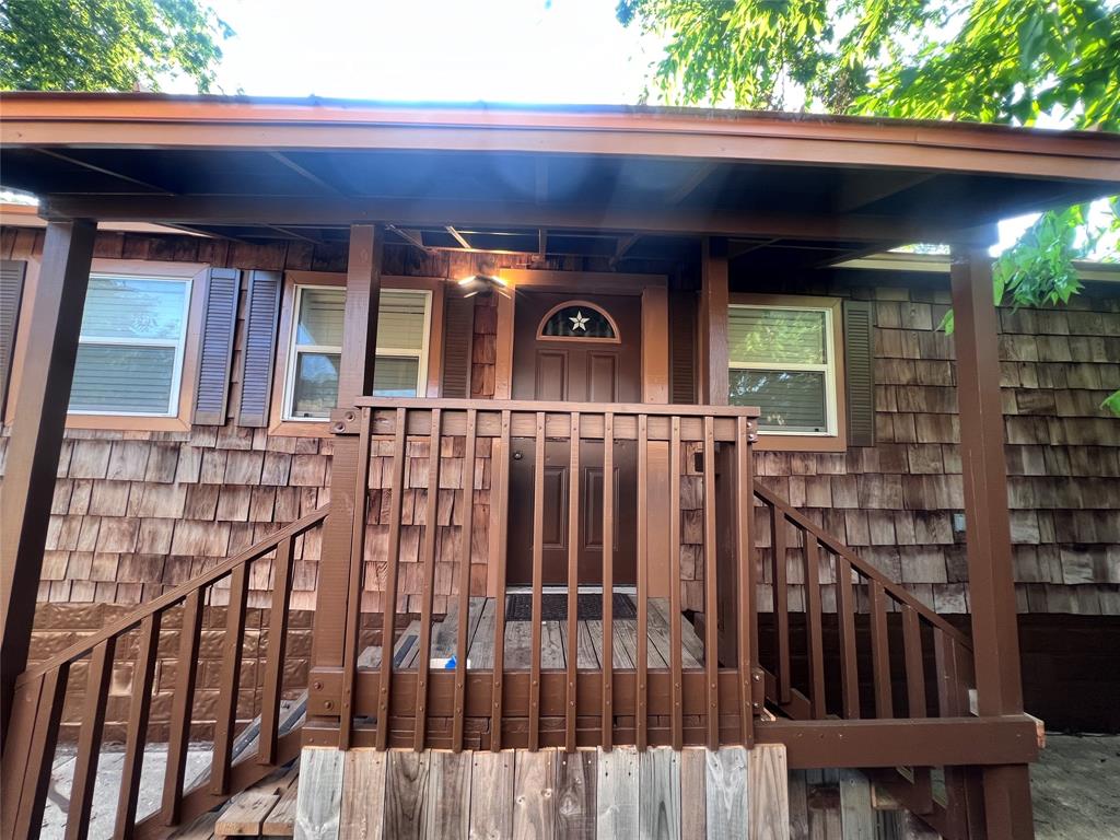 1000 East 53rd Street, Unit B Austin, TX 78751 - Photo 1 of 1 a view of a house with a small deck