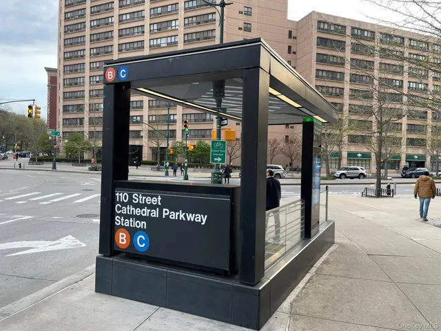 a view of a building with sitting area
