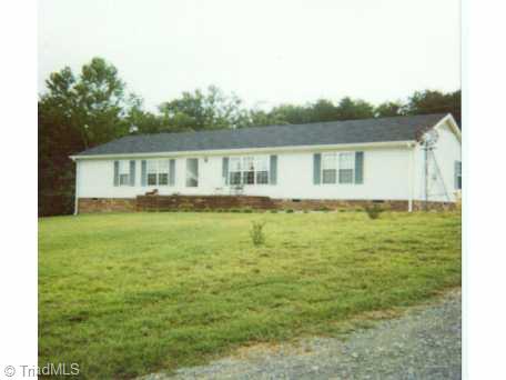 6933 Red Bank Road Germanton, NC 27019 - Photo 1 of 1 Exterior Front. Doublewide with 44 ACRES! Has Pond & 23 Stall Barn!