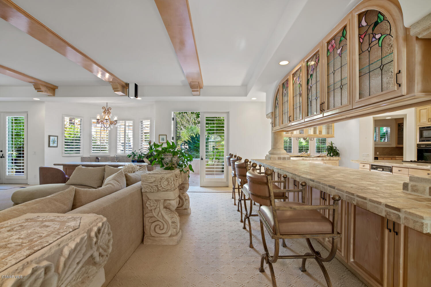 6021 John Muir Road Hidden Hills, CA 91302 - Photo 21 of 74 a living room with furniture a chandelier and wooden floor