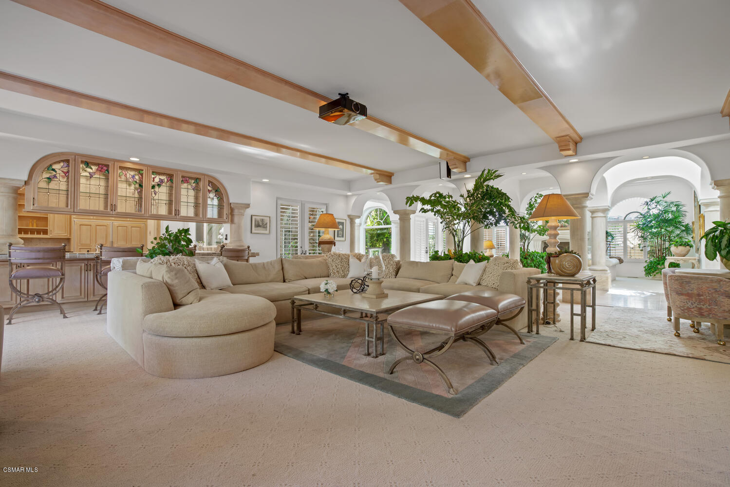 6021 John Muir Road Hidden Hills, CA 91302 - Photo 24 of 74 a living room with furniture and a large window